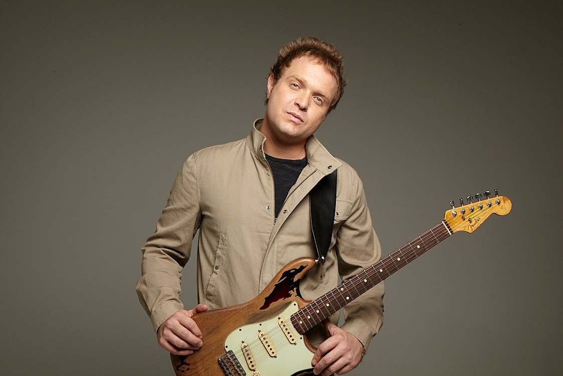 Roney Giah with his guitar